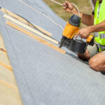 roofing membrane being installed